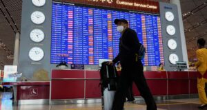 Sandstorms, high winds prompt Beijing to cancel hundreds of flights and close parks