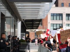 Protesters rally against Elon Musk at Tesla showrooms over the continued U.S. government purge