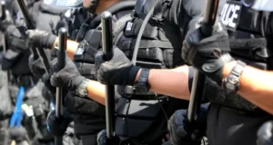 Black Caucus Chair Akilah Weber Pierson Applauds California Ban on Police Officers Wearing Face Masks